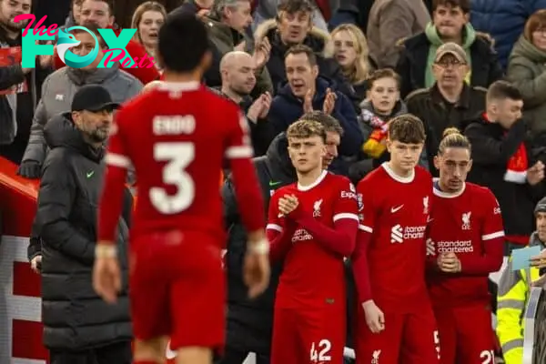 LIVERPOOL, ENGLAND - Saturday, February 10, 2024: Liverpool's substitutes Bobby Clark, James McConnell and Kostas Tsimikas prepare to come on during the FA Premier League match between Liverpool FC and Burnley FC at Anfield. (Photo by David Rawcliffe/Propaganda)