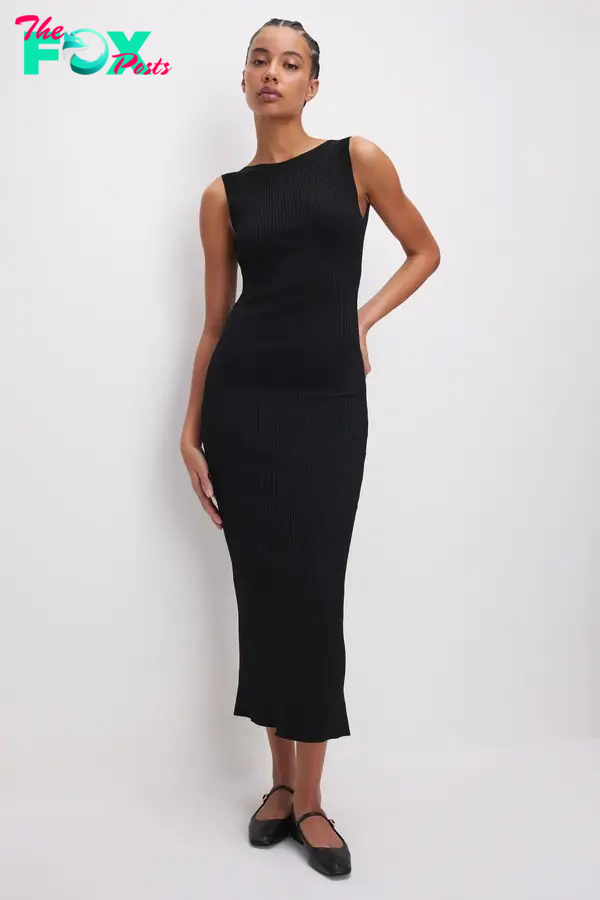 A model in a black dress