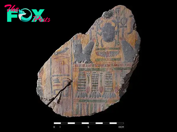 The trash pile was discovered when researchers were reconstructing a tomb inside the Temple of Hatshepsut. Pictured is a piece of the tomb wall