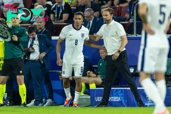 COLOGNE, GERMANY - Tuesday, June 25, 2024: England's substitute Trent Alexander-Arnold is brought on by head coach Gareth Southgate during the UEFA Euro 2024 Group C match between England and Slovenia at the Müngersdorfer Stadium. (Photo by David Rawcliffe/Propaganda)