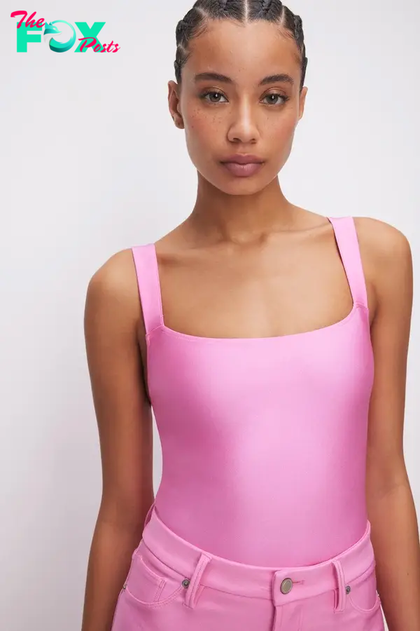 A shiny pink bodysuit