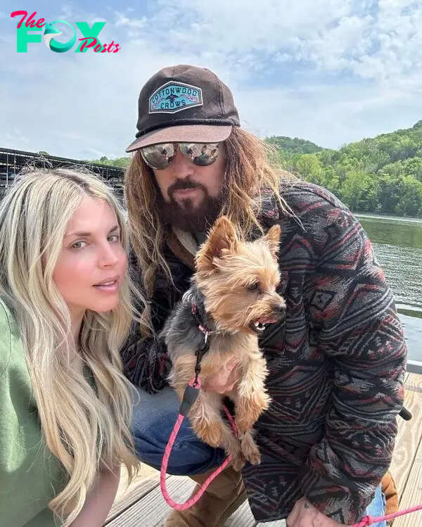 Firerose Cyrus and Billy Ray Cyrus and their pet dog.