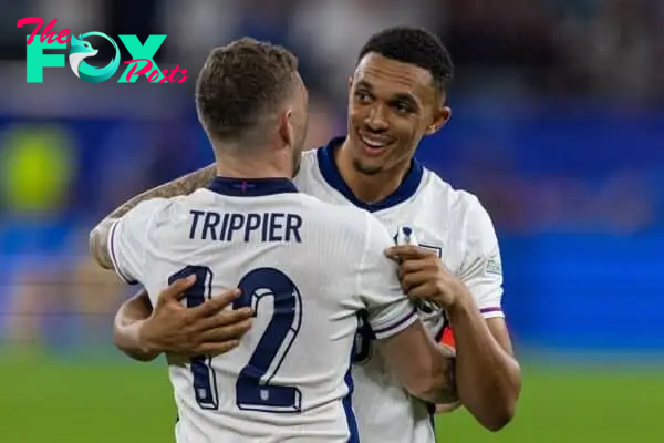 GELSENKIRCHEN, GERMANY - Sunday, June 16, 2024: England's Trent Alexander-Arnold (R) celebrates with team-mate Kieran Trippier after the UEFA Euro 2024 Group C match between Serbia and England at the Arena AufSchalke. England won 1-0. (Photo by David Rawcliffe/Propaganda)