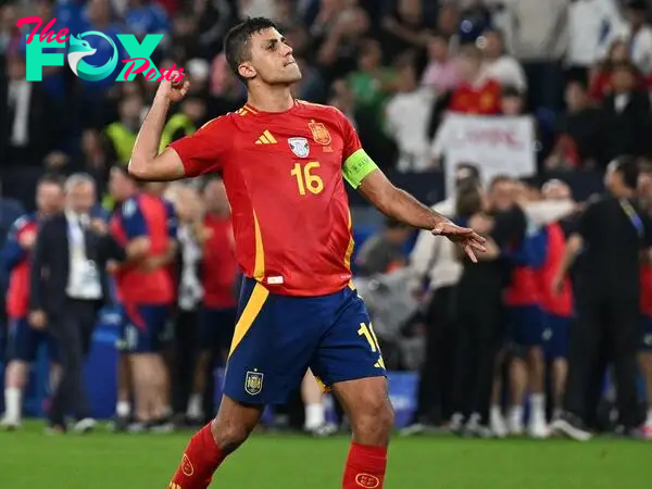 Spain midfielder Rodri celebrates La Roja's matchday-two win over Italy.