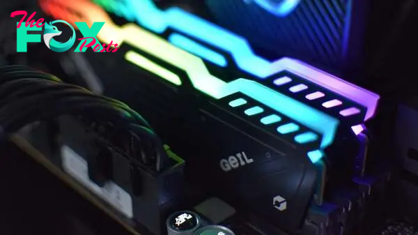 Two sticks of Geil DDR5 RGB RAM installed in a motherboard.