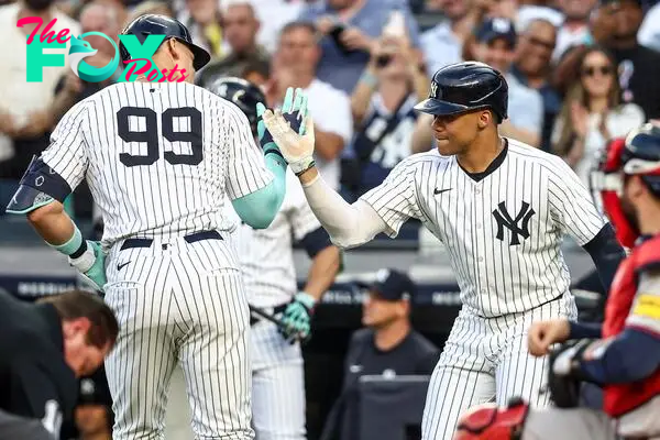 Jun 22, 2024; Bronx, New York, USA; New York Yankees center fielder Aaron Judge (99) celebrates with right fielder Juan Soto (22) after hitting a two run home run against the Atlanta Braves in the first inning at Yankee Stadium. Mandatory Credit: Wendell Cruz-USA TODAY Sports