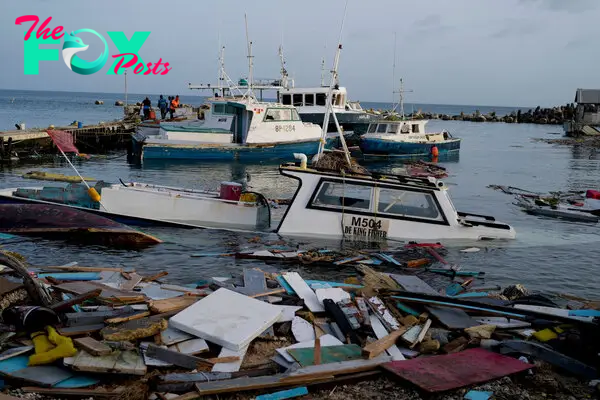 Boats damaged by Hurricane Beryl wade in the water at the Bridgetown Fisheries, Barbados, on July 2, 2024.