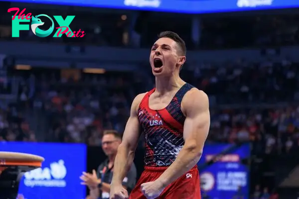 Paul Juda celebrates after competing on the vault during the men's U.S. Olympic Gymnastics Trials , in Minneapolis on June 29, 2024.