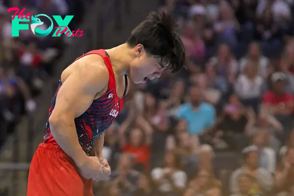 Asher Hong reacts after his floor routine during the Men's U.S. Olympic Gymnastics Team Trials in Minneapolis on June 29, 2024.