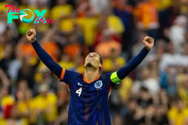 MUNICH, GERMANY - Tuesday, July 2, 2024: Netherlands' captain Virgil van Dijk celebrates his side's third goal during the UEFA Euro 2024 Round of 16 match between Romania and the Netherlands at the Allianz Arena. The Netherlands won 3-0.(Photo by David Rawcliffe/Propaganda)