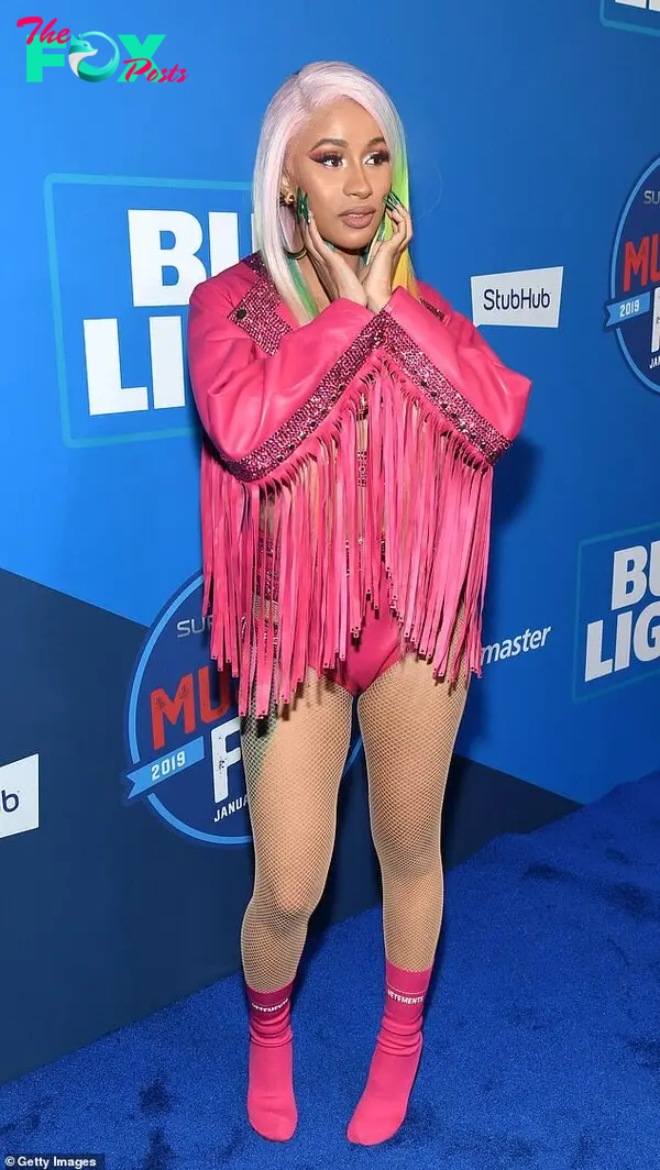 Cardi B wears a pink leather ensemble as she leads stars at Bud Light Super Bowl Music Fest | Daily Mail Online