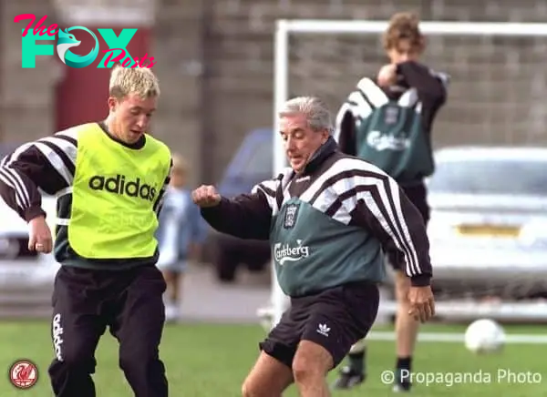 Liverpool's Robbie Fowler (L) and manager Roy Evans during a training session at Melwood Training Ground.