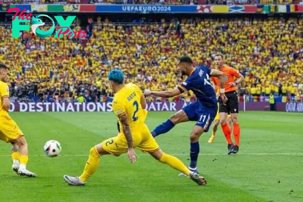 MUNICH, GERMANY - Tuesday, July 2, 2024: Netherlands' Cody Gakpo scores the opening goal during the UEFA Euro 2024 Round of 16 match between Romania and the Netherlands at the Allianz Arena. (Photo by David Rawcliffe/Propaganda)