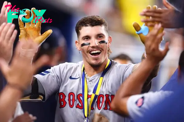 MIAMI, FLORIDA - JULY 02: Jarren Duran #16 of the Boston Red Sox celebrates with teammates after hitting a home run against the Miami Marlins during the eighth inning of the game at loanDepot park on July 02, 2024 in Miami, Florida.   Megan Briggs/Getty Images/AFP (Photo by Megan Briggs / GETTY IMAGES NORTH AMERICA / Getty Images via AFP)