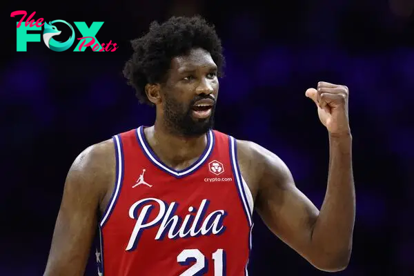 PHILADELPHIA, PENNSYLVANIA - APRIL 28: Joel Embiid #21 of the Philadelphia 76ers reacts during the fourth quarter against the New York Knicks during game four of the Eastern Conference First Round Playoffs at the Wells Fargo Center on April 28, 2024 in Philadelphia, Pennsylvania. NOTE TO USER: User expressly acknowledges and agrees that, by downloading and/or using this Photograph, user is consenting to the terms and conditions of the Getty Images License Agreement.   Tim Nwachukwu/Getty Images/AFP (Photo by Tim Nwachukwu / GETTY IMAGES NORTH AMERICA / Getty Images via AFP)