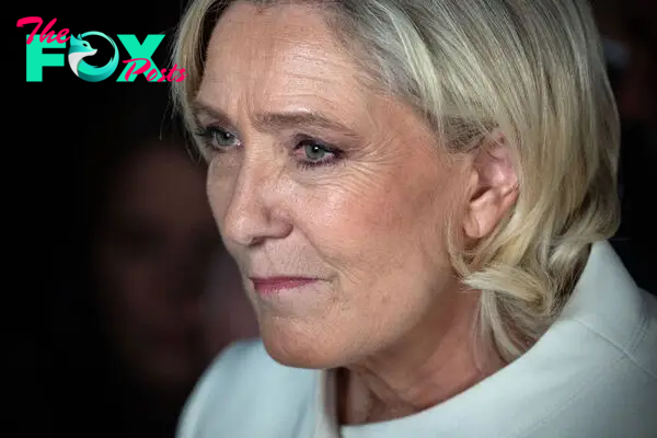 National Rally Parliamentary leader Marine Le Pen speaks to the press and supporters following her party's defeat in the French parliamentary elections on July 7, 2024 in Paris, France.