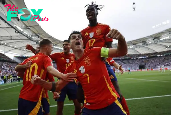 Dani Olmo celebrates with Morata, Nico Williams, Rodrigo and Carvajal.