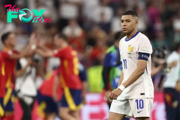 France's forward #10 Kylian Mbappe reacts at the end of the UEFA Euro 2024 semi-final football match between Spain and France at the Munich Football Arena in Munich on July 9, 2024. (Photo by FRANCK FIFE / AFP)