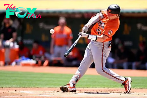 OAKLAND, CALIFORNIA - JULY 06: Adley Rutschman #35 of the Baltimore Orioles hits against the Oakland Athletics in the first inning at Oakland Coliseum on July 6, 2024 in Oakland, California.   Eakin Howard/Getty Images/AFP (Photo by Eakin Howard / GETTY IMAGES NORTH AMERICA / Getty Images via AFP)