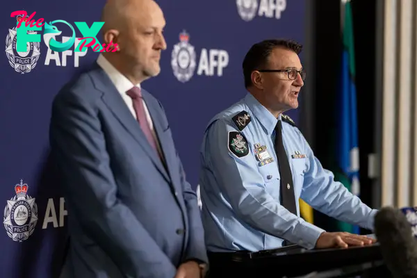 Australian Security Intelligence Organisation director-general Mike Burgess and Australian Federal Police commissioner Reece Kershaw reveal the arrests of two Russian-born Australian citizens accused of planned espionage Friday, July 12, 2024.