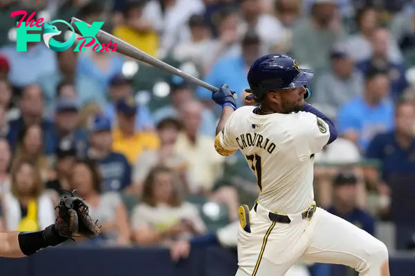 MILWAUKEE, WISCONSIN - JULY 09: Jackson Chourio #11 of the Milwaukee Brewers reaches first base on a throwing error by Jared Triolo #19 of the Pittsburgh Pirates in the third inning at American Family Field on July 09, 2024 in Milwaukee, Wisconsin.   Patrick McDermott/Getty Images/AFP (Photo by Patrick McDermott / GETTY IMAGES NORTH AMERICA / Getty Images via AFP)