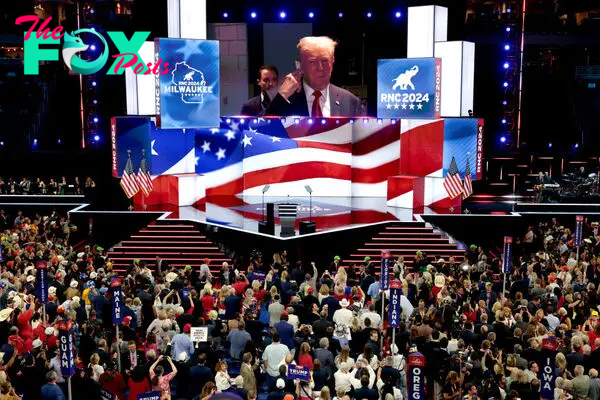 Former President Donald Trump displayed on screen while arriving to the Republican National Convention (RNC) at the Fiserv Forum in Milwaukee, Wisconsin, on July 15, 2024.