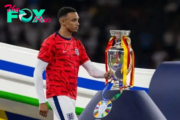 BERLIN, GERMANY - Sunday, July 14, 2024: England's Trent Alexander-Arnold looks dejected as he walks past the trophy after the UEFA Euro 2024 Final match between Spain and England at the Olympiastadion. Spain won 2-1. (Photo by David Rawcliffe/Propaganda)