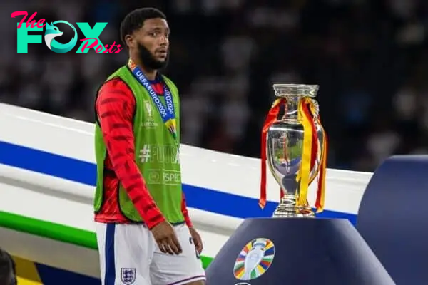 BERLIN, GERMANY - Sunday, July 14, 2024: England's Joe Gomez looks dejected as he walks past the trophy after the UEFA Euro 2024 Final match between Spain and England at the Olympiastadion. Spain won 2-1. (Photo by David Rawcliffe/Propaganda)