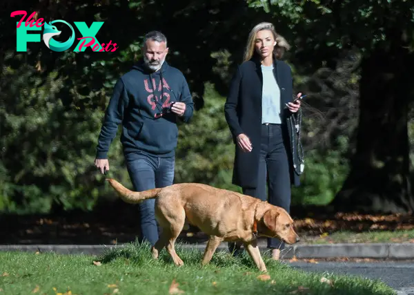 The couple were seen walking Giggs' dog