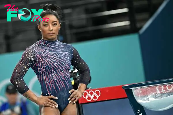 Why was Simone Biles absent from the Paris Olympics opening ceremony?