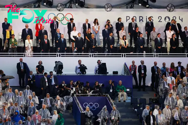 French President Emmanuel Macron and his wife Brigitte Macron stood alongside International Olympic Committee President Thomas Bach during the opening ceremony of the Paris 2024 Olympics.