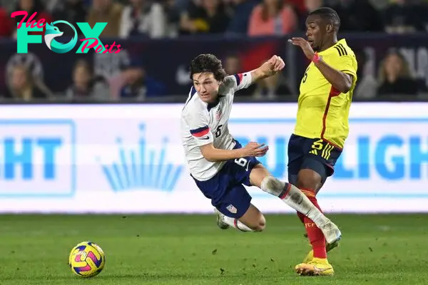 USA's midfielder Paxten Aaronson (L) and Colombia's defender Juan David Mosquera vie for the ball during the international friendly football match between the USA and Colombia at the Dignity Health Sports Park in Carson, California, on January 28, 2023. (Photo by Patrick T. FALLON / AFP)