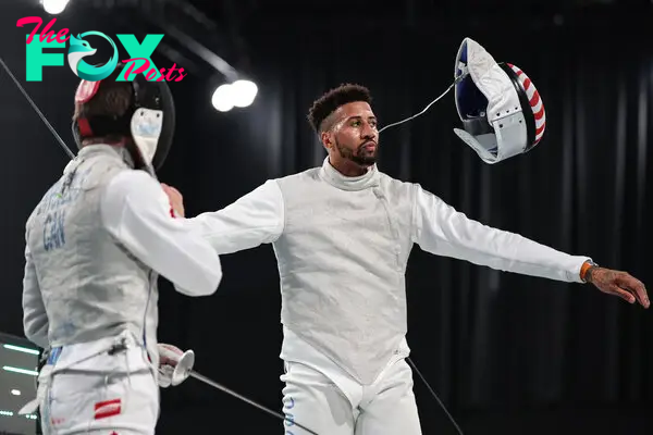 Miles Chamley-Watson of Team USA gestures on Men’s Foil Individual Semifinal