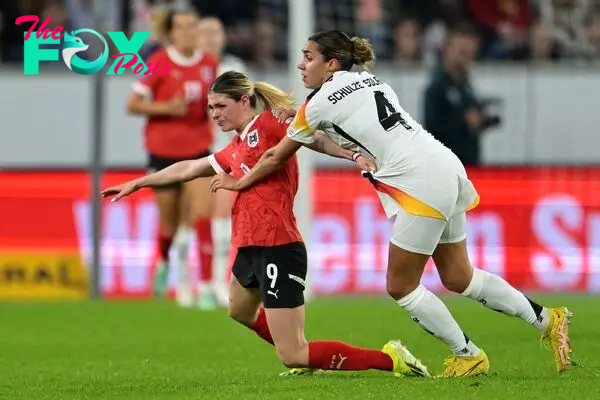 Austria's forward #09 Eileen Campbell (L) is fouled by Germany's defender #04 Bibiane Schulze Solano during the UEFA Women's Euro 2025 qualifying football match between Austria and Germany in Linz, Austria on April 5, 2024. (Photo by Joe Klamar / AFP)