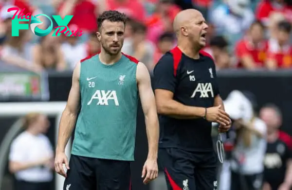 PHILADELPHIA - Sunday, July 28, 2024: Liverpool's Diogo Jota (L) and head coach Arne Slot during an open training session at Lincoln Financial Field on day five of the club's pre-season tour of the USA. (Photo by David Rawcliffe/Propaganda)