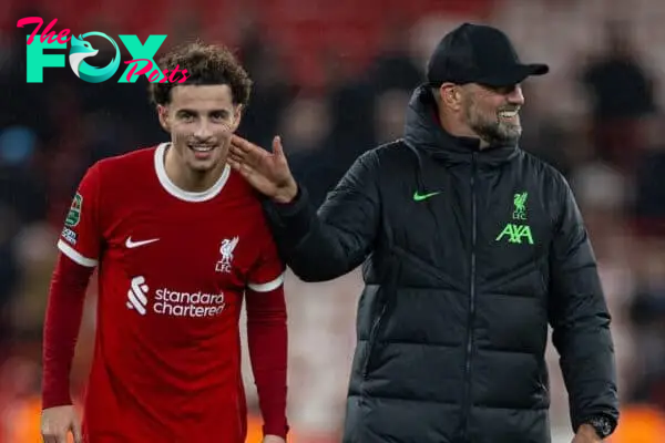 LIVERPOOL, ENGLAND - Wednesday, December 20, 2023: Liverpool's manager Jürgen Klopp celebrates with two-goal hero Curtis Jones (L) after the Football League Cup Quarter-Final match between Liverpool FC and West Ham United FC at Anfield. Liverpool won 5-1. (Photo by David Rawcliffe/Propaganda)