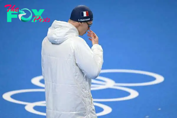 Here’s why swimmers are often be seen wearing coats ahead of competing.