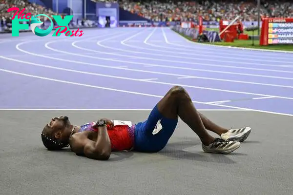 US' Noah Lyles reacts after competing in the men's 200m final of the athletics event at the Paris 2024 Olympic Games at Stade de France in Saint-Denis, north of Paris, on August 8, 2024. (Photo by Jewel SAMAD / AFP)