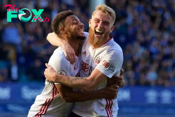 LIVERPOOL, ENGLAND - Saturday, September 21, 2019: Sheffield United's Lys Mousset (L) celebrates scoring the second goal with team-mate Oliver McBurnie during the FA Premier League match between Everton FC and Sheffield United FC at Goodison Park. Sheffield United won 2-0. (Pic by David Rawcliffe/Propaganda)