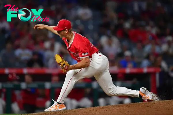 August 16, 2024; Anaheim, California, USA; Los Angeles Angels pitcher Ben Joyce (44) throws against the Atlanta Braves during the ninth inning at Angel Stadium. Mandatory Credit: Gary A. Vasquez-USA TODAY Sports