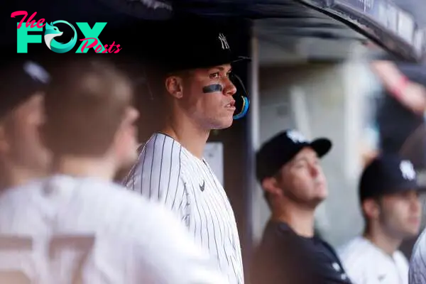 NEW YORK, NEW YORK - AUGUST 20: Aaron Judge #99 of the New York Yankees looks on from the dugout during the eighth inning against the Boston Red Sox at Yankee Stadium on August 20, 2023 in the Bronx borough of New York City.   Sarah Stier/Getty Images/AFP (Photo by Sarah Stier / GETTY IMAGES NORTH AMERICA / Getty Images via AFP)