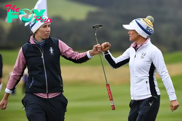 Las golfistas españolas Carlota Ciganda y Azahara Muñoz, durante una edición de la Solheim Cup.