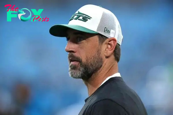 CHARLOTTE, NORTH CAROLINA - AUGUST 17: Aaron Rodgers #8 of the New York Jets looks on before their preseason game against the Carolina Panthers at Bank of America Stadium on August 17, 2024 in Charlotte, North Carolina.   Grant Halverson/Getty Images/AFP (Photo by GRANT HALVERSON / GETTY IMAGES NORTH AMERICA / Getty Images via AFP)