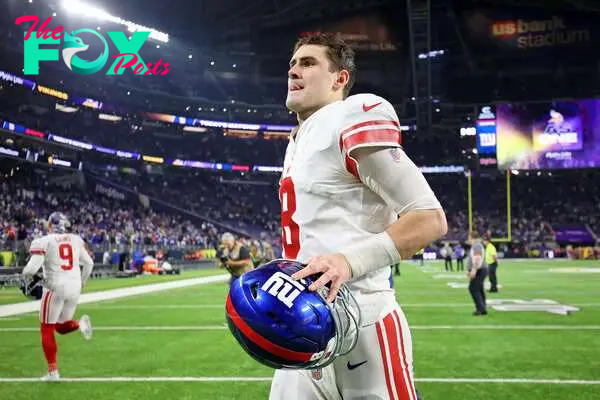 Jan 15, 2023; Minneapolis, Minnesota, USA; New York Giants quarterback Daniel Jones (8) runs off the field after winning a wild card game against the Minnesota Vikings at U.S. Bank Stadium. Mandatory Credit: Matt Krohn-USA TODAY Sports