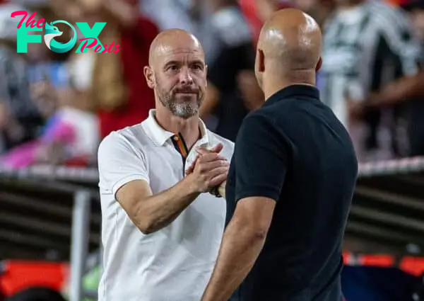 COLUMBIA - Saturday, August 3, 2024: Manchester United's manager Erik ten Hag (L) shakes hands with Liverpool's head coach Arne Slot during a pre-season friendly match between Liverpool FC and Manchester United FC at the Williams-Brice Stadium on day eleven of the club's pre-season tour of the USA. Liverpool won 3-0. (Photo by David Rawcliffe/Propaganda)