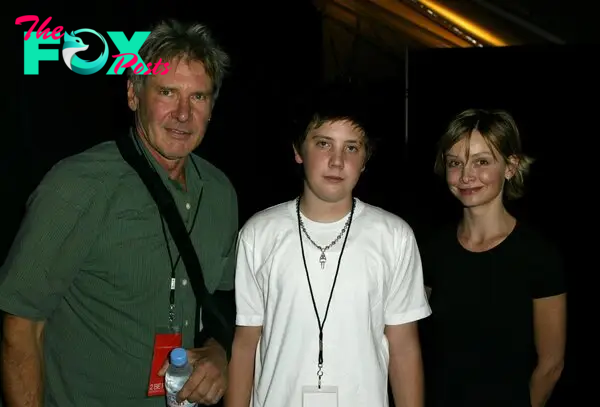 Harrison Ford, Malcolm Ford, and Calista Flockhart at Smashbox LA Fashion Week Spring in Culver City, California, on October 27, 2003 | Source: Getty Images