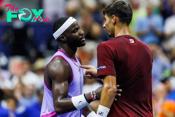 Frances Tiafoe (USA) embraces Alexei Popyrin (AUS) after their match at the 2024 U.S. Open.