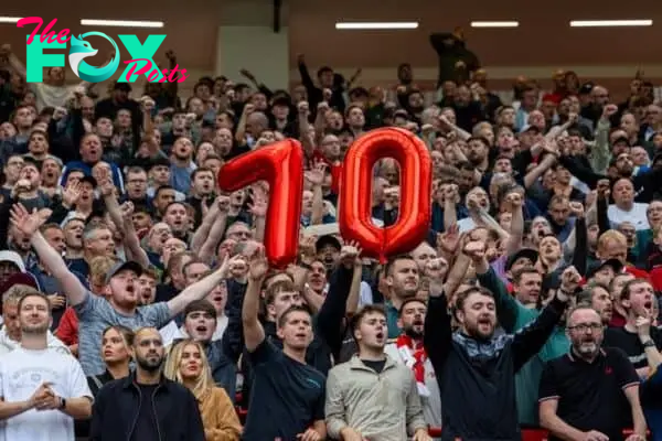 MANCHESTER, ENGLAND - Sunday, September 1, 2024: Liverpool supporters hold up balloons to celebrate their recent 7-0 victory over Manchester United before the FA Premier League match between Manchester United FC and Liverpool FC at Old Trafford. (Photo by David Rawcliffe/Propaganda)