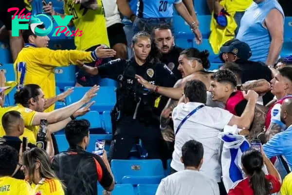 2XGY1W6 CHARLOTTE, NC - JULY 10: Uruguay forward Darwin Nunez (19) engages with hostile fans in the stands after the CONMEBOL Copa America semifinal between Uruguay and Colombia on Wednesday July 10, 2024 at Bank of America Stadium in Charlotte, NC. (Photo by Nick Tre. Smith/Icon Sportswire) (Icon Sportswire via AP Images)