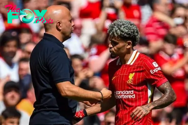 LIVERPOOL, ENGLAND - Sunday, August 11, 2024: Liverpool's head coach Arne Slot (L) and Luis Díaz during a pre-season friendly match between Liverpool FC and Sevilla FC at Anfield. (Photo by David Rawcliffe/Propaganda)